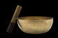 brass tibetan singing bowl with wooden striking mallet 